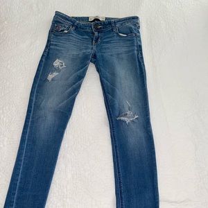 Low waisted semi distressed skinny jeans